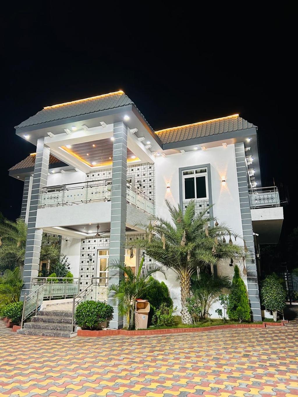 The farmhouse at night at Liven Horizon Villa, Tolkatta, Moinabad