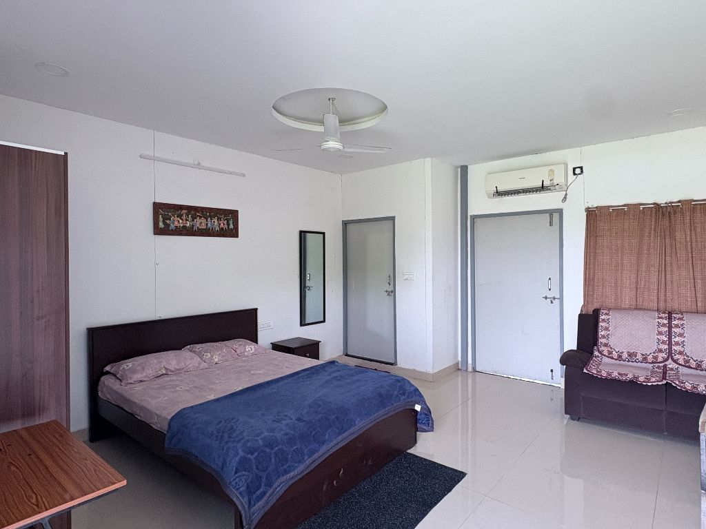 Bedroom at Eshwara Greens Farm, Aziz Nagar, Moinabad