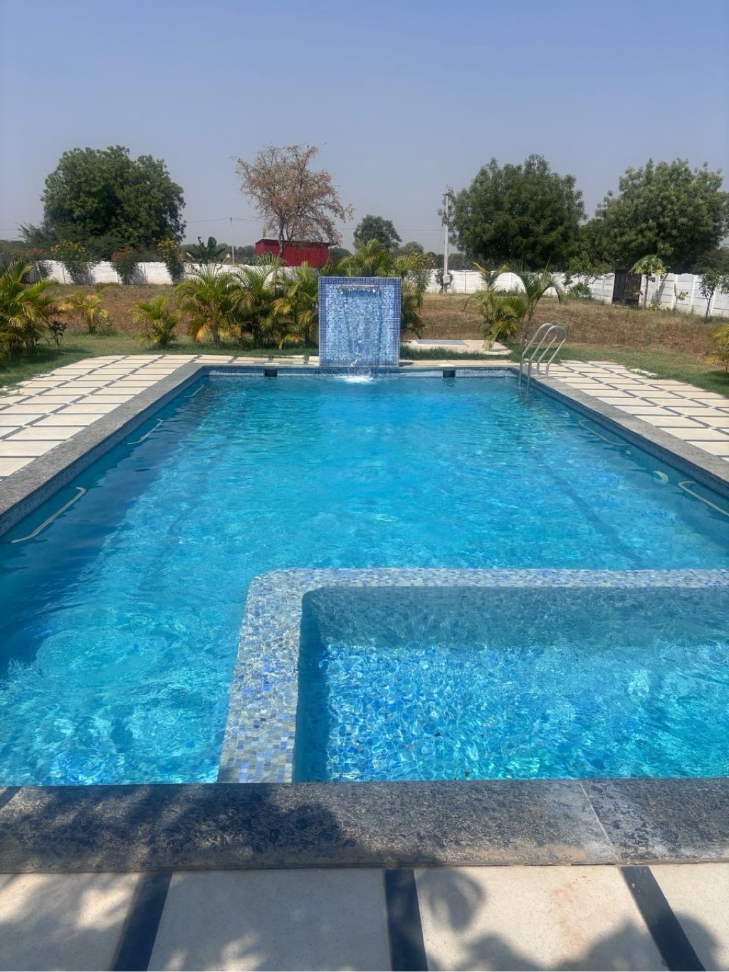 Private swimming pool at SP Aura Farms, Moinabad