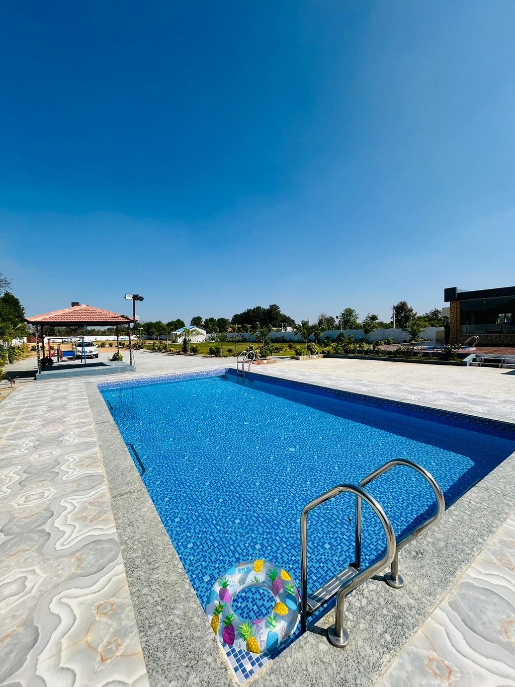 Private swimming pool at Riztik Villa, Amdapur, Moinabad