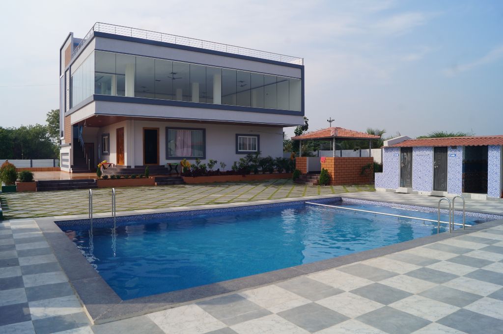 Private swimming pool at Brindha Villa Farmhouse, Amdapur, Moinabad